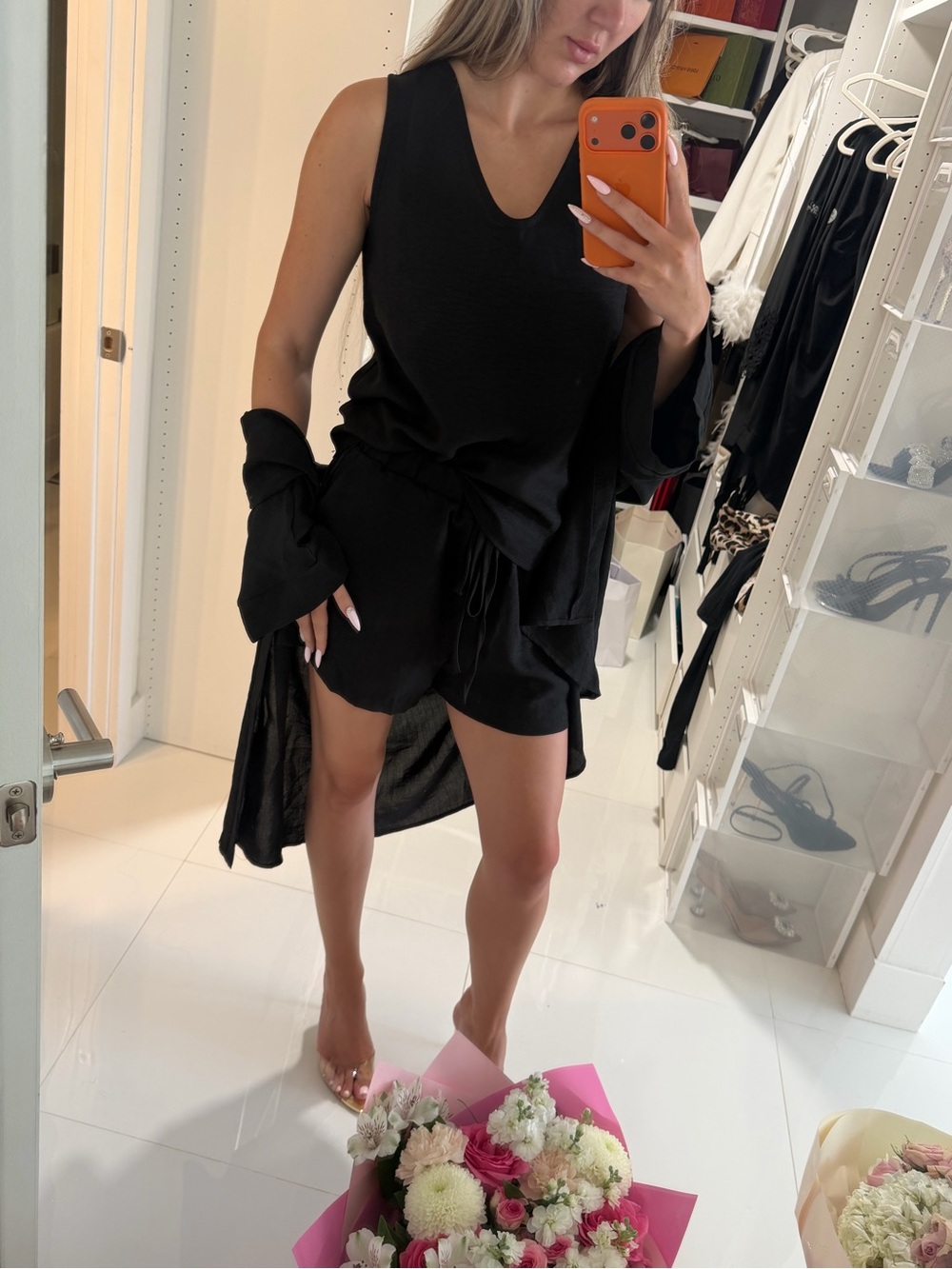Black Sleeveless V‑Neck Dress with Tie Waist